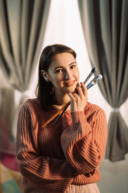 Professional singing lessons instructor demonstrating vocal techniques and music training methods